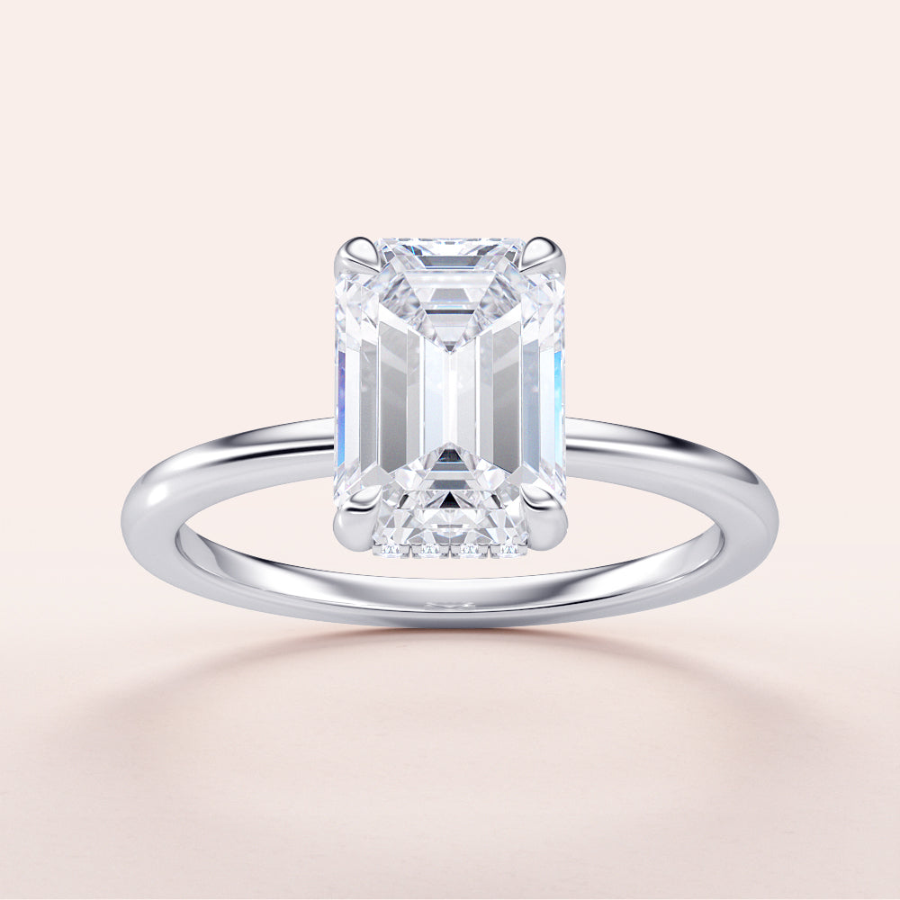 Elegant 14K/18K white gold engagement ring featuring emerald-cut diamond and hidden halo, perfect for special occasions.|

#14KRecycledWhiteGold
#18KRecycledWhiteGold








#Platinum
