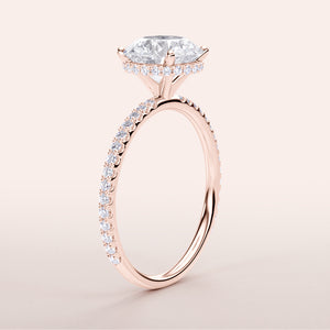 "Elegant Rose Gold engagement ring with round wrapped hidden halo and pave band, available in 14K, 18K, or platinum."