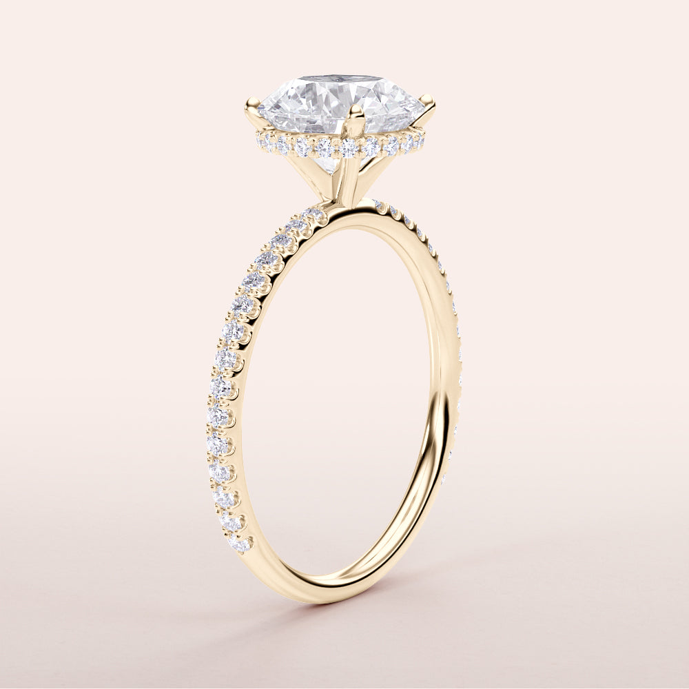 Elegant 14K Yellow Gold round cut engagement ring with halo design andPave diamonds, perfect for timeless romance.
