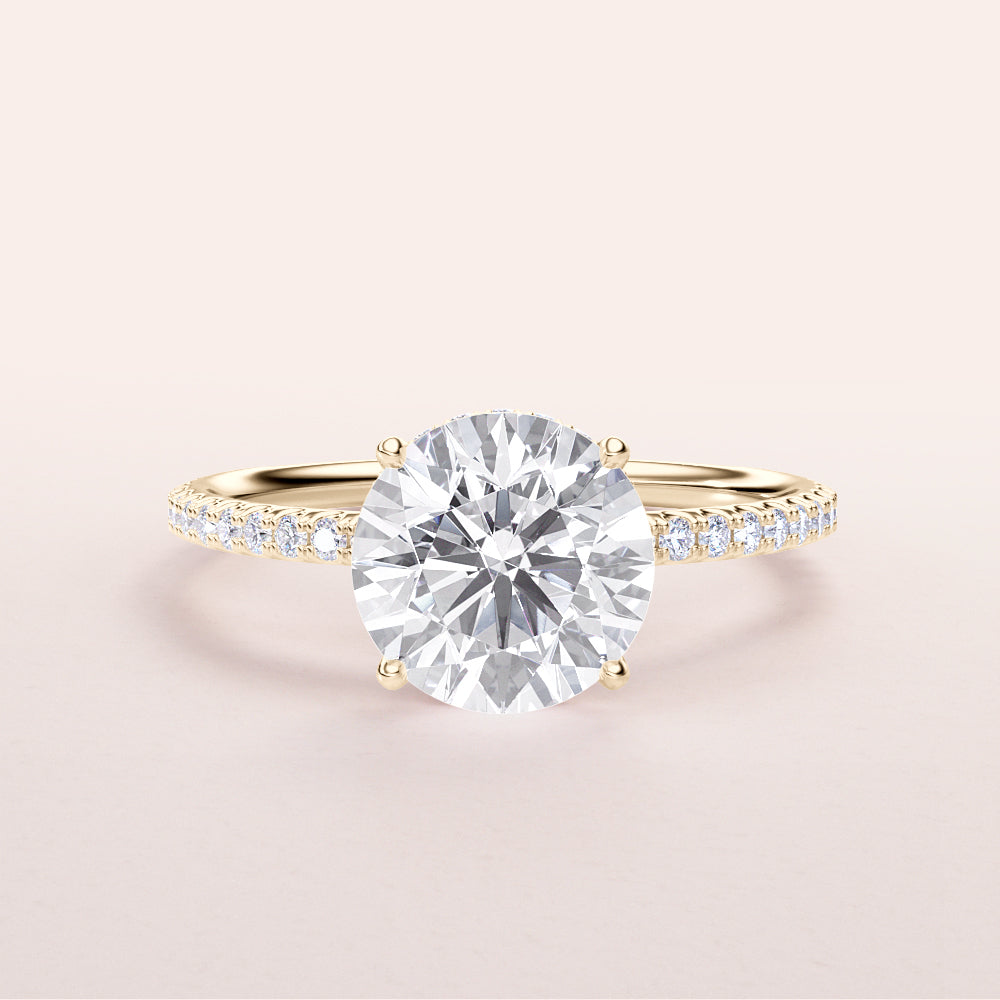 Round Brilliant Diamond Engagement Ring in 14K or 18K Gold with Hidden Halo andPave Band design.