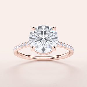 Elegant 14K Rose Gold Engagement Ring featuring a Round Brilliant-Cut Diamond and Pave-Set Diamonds on Band.