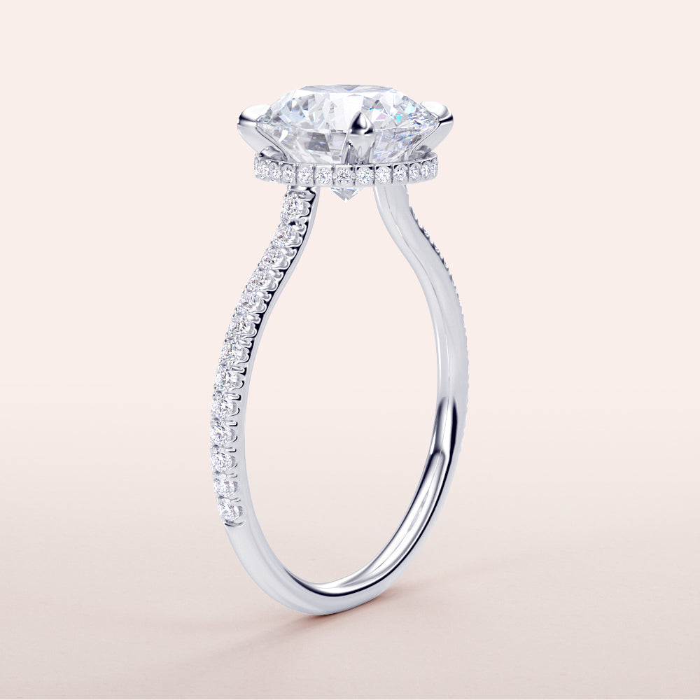 Elegant 14K white gold engagement ring with marquise diamond andPave band. Available in 18K or platinum. Not worn on model.|

#14KRecycledWhiteGold
#18KRecycledWhiteGold








#Platinum