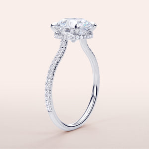 Elegant 14K white gold engagement ring with marquise diamond andPave band. Available in 18K or platinum. Not worn on model.