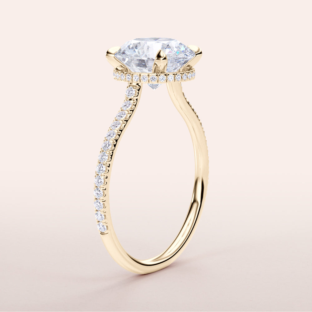 Elegant yellow gold 14K or 18K engagement ring with hidden halo andPave band, featuring a stunning round diamond.|




#14KRecycledYellowGold
#18KRecycledYellowGold





