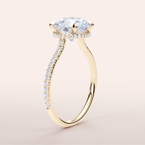 Elegant yellow gold 14K or 18K engagement ring with hidden halo andPave band, featuring a stunning round diamond.