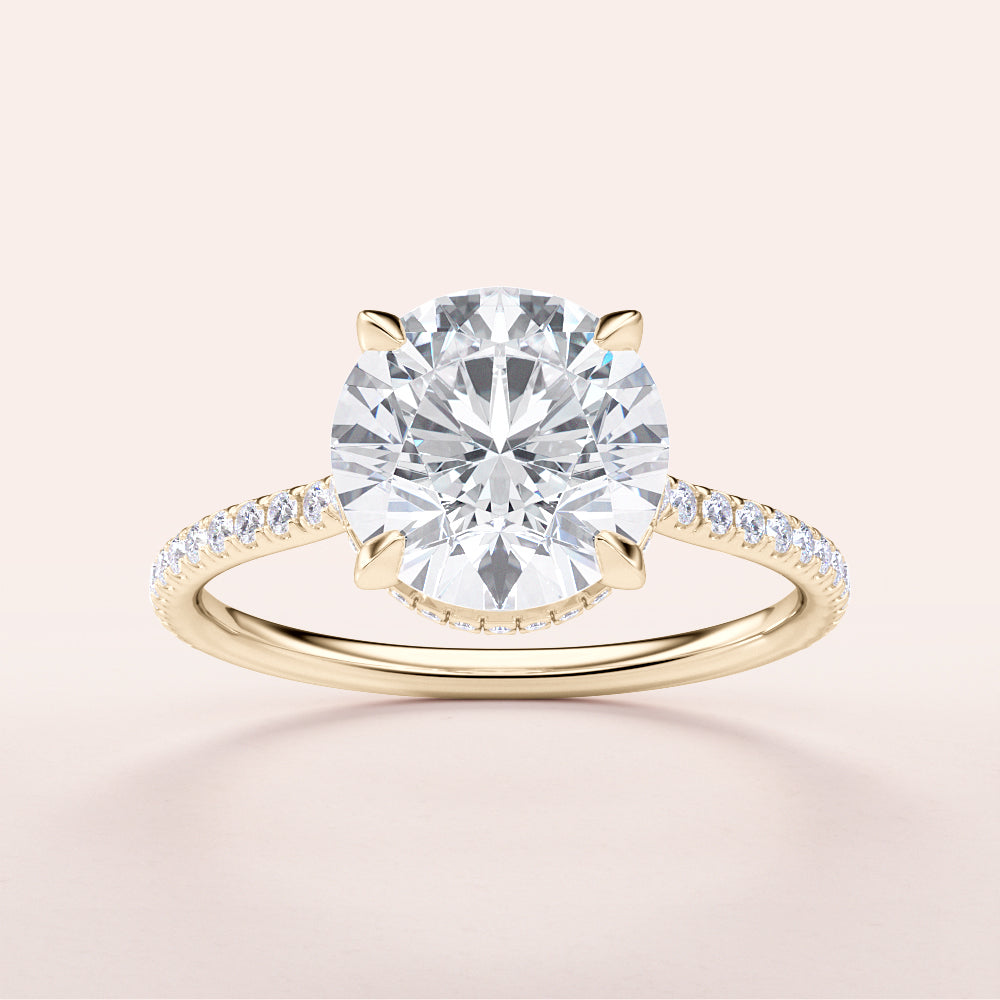 14K gold engagement ring featuring a round brilliant diamond center stone with a delicatePave diamond band, showcasing timeless elegance.|




#14KRecycledYellowGold
#18KRecycledYellowGold





