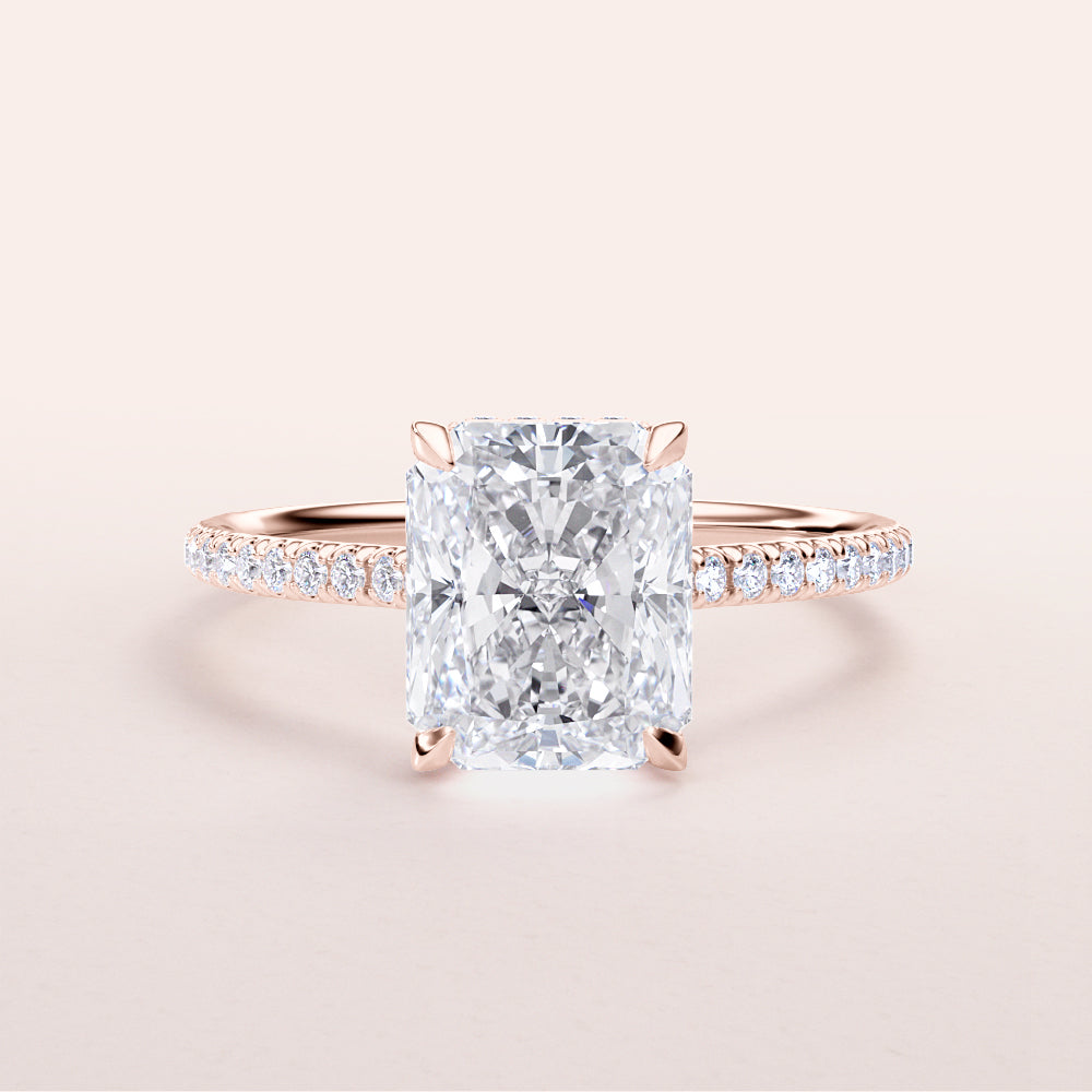 Radiant cut diamond engagement ring in 14K rose gold with delicate diamondPave band for a stunning look.|







#14KRecycledRoseGold
#18KRecycledRoseGold


