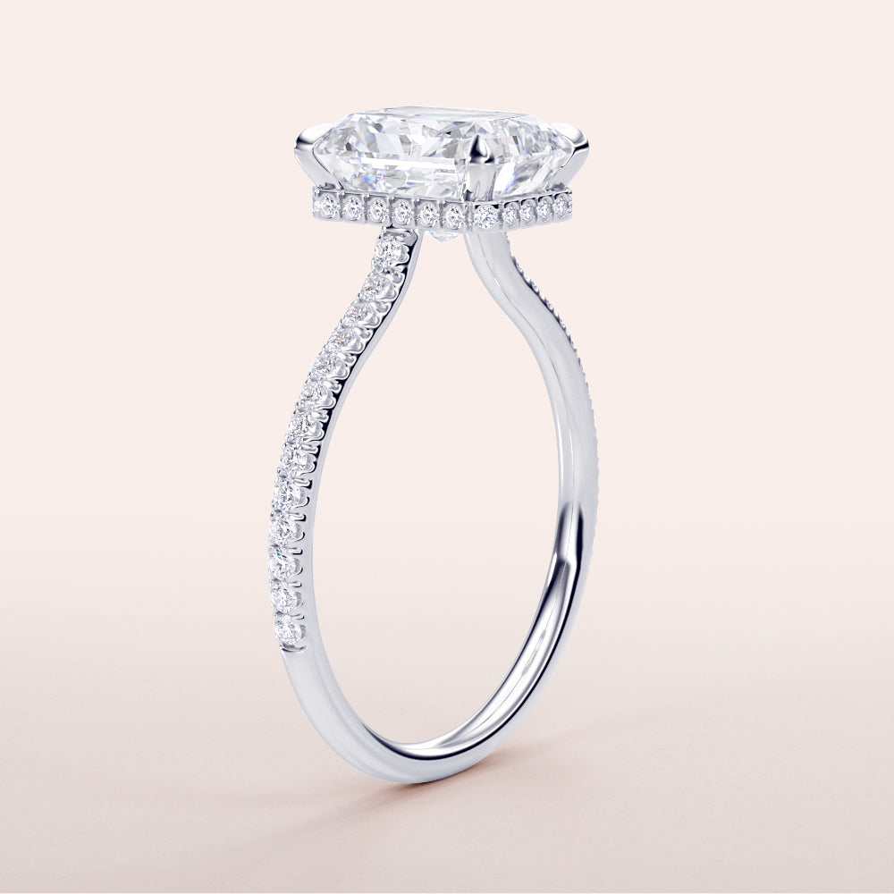 "Luxurious 14K or 18K white gold engagement ring with marquise-cut diamond and pave-set band, showcasing timeless elegance."|

#14KRecycledWhiteGold
#18KRecycledWhiteGold








#Platinum
