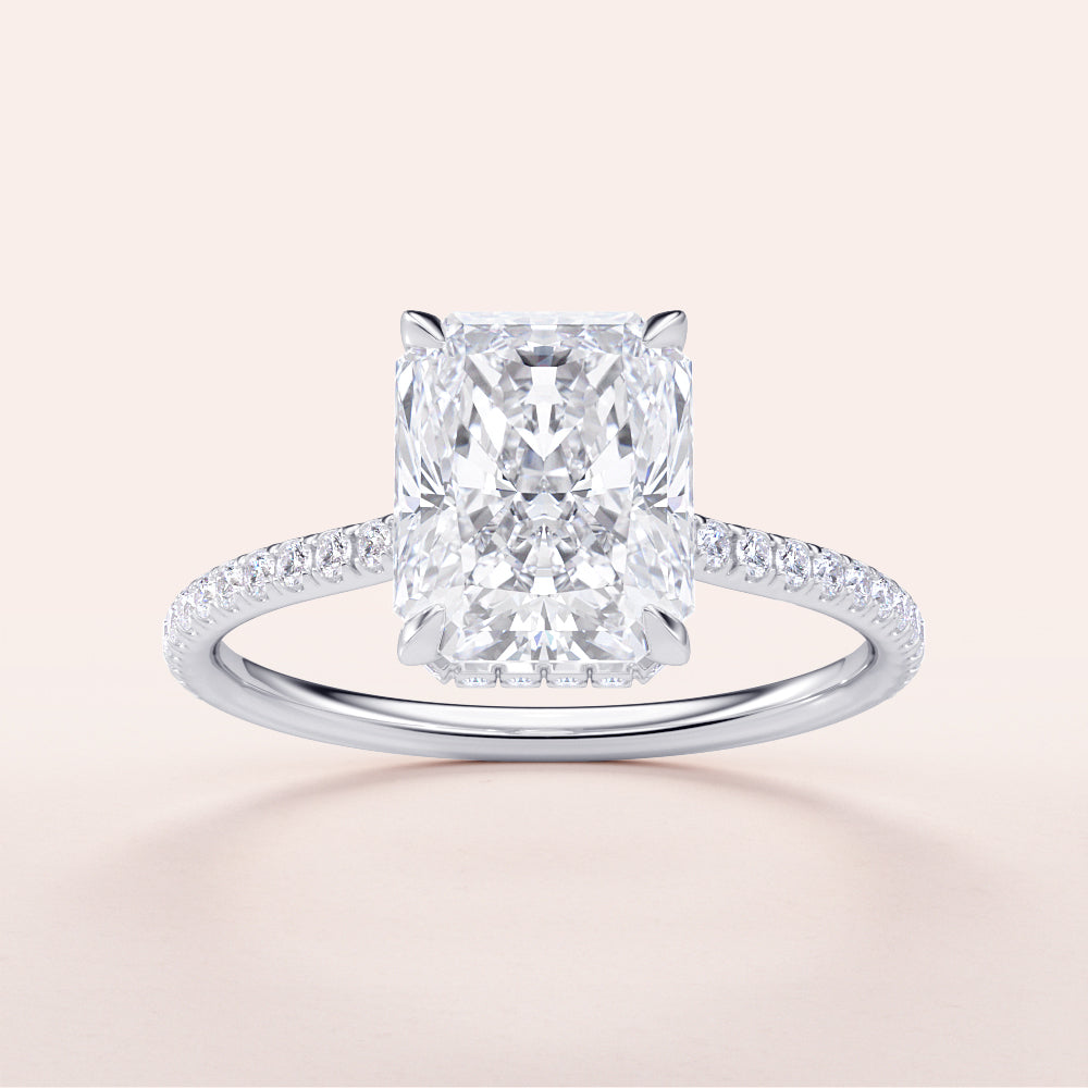 Radiant cut diamond engagement ring with a diamond-encrusted band in 14K white gold. Elegant timeless design, stunning brilliance.|

#14KRecycledWhiteGold
#18KRecycledWhiteGold








#Platinum