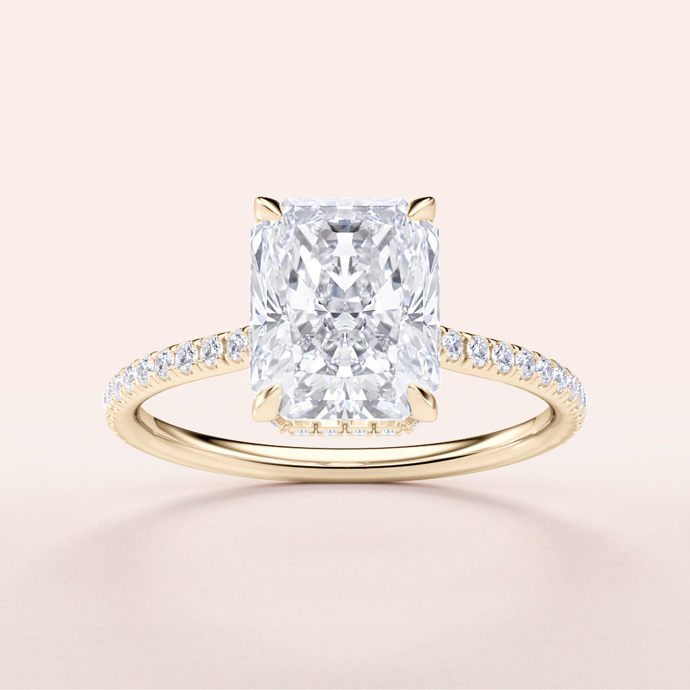 Radiant-cut diamond engagement ring in 14K or 18K gold, featuring a dazzlingPave band; unworn and perfect for any occasion.|




#14KRecycledYellowGold
#18KRecycledYellowGold





