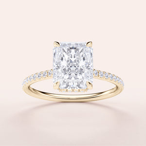 Radiant-cut diamond engagement ring in 14K or 18K gold, featuring a dazzlingPave band; unworn and perfect for any occasion.