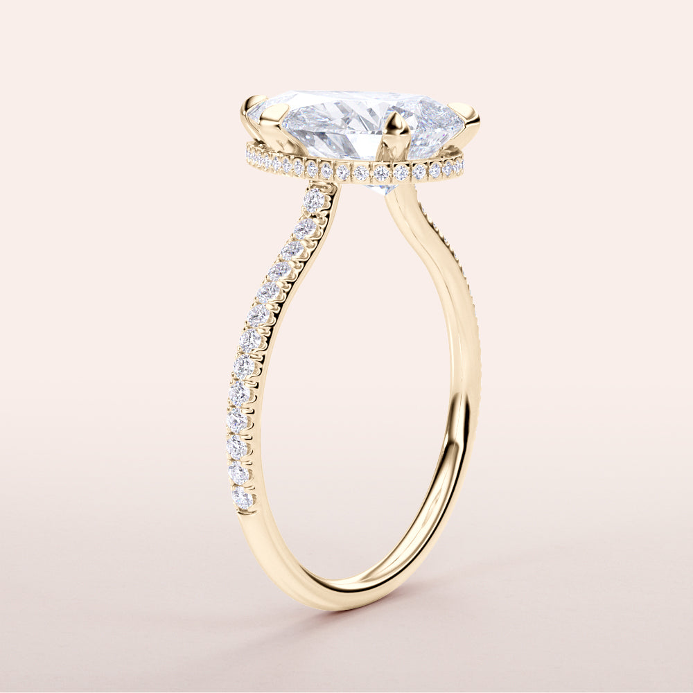 Elegant yellow gold engagement ring featuring a marquise diamond with aPave band, available in 14K, 18K, or platinum.|




#14KRecycledYellowGold
#18KRecycledYellowGold





