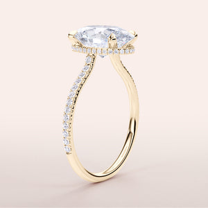 Elegant yellow gold engagement ring featuring an oval diamond and a diamond-encrusted band, available in 14K, 18K, or platinum.