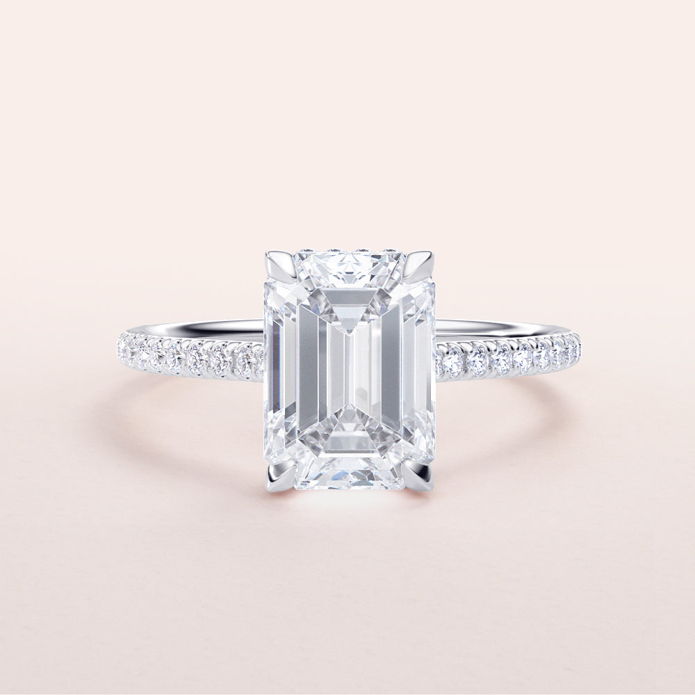 Emerald-cut diamond engagement ring in 14K/18K white gold with pave band, featuring an invisible gallery and hidden halo design.|

#14KRecycledWhiteGold
#18KRecycledWhiteGold








#Platinum