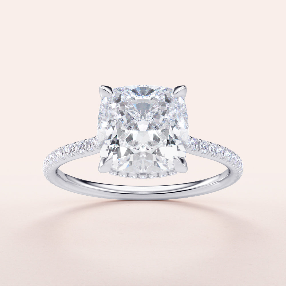 Elegant 14K and 18K gold or platinum cushion-cut diamond engagement ring withPave band, showcasing timeless beauty and sparkle.|

#14KRecycledWhiteGold
#18KRecycledWhiteGold








#Platinum