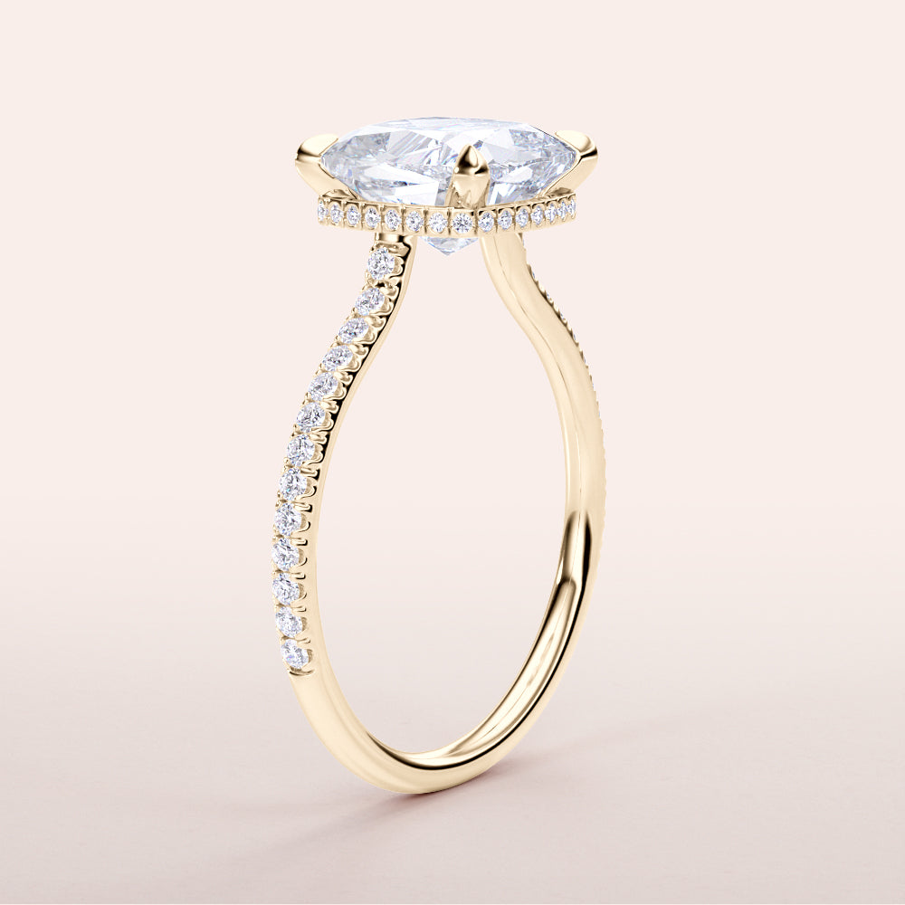 Elegant yellow gold engagement ring in 14K/18K featuring a round diamond and halo design, not worn on model.|




#14KRecycledYellowGold
#18KRecycledYellowGold





