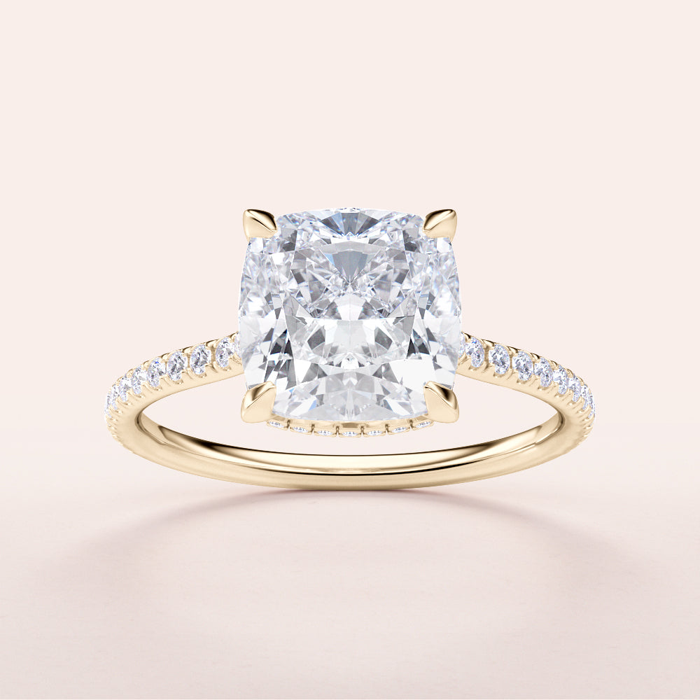 Elegant 14K or 18K gold cushion-cut diamond engagement ring with a hidden halo and shimmering pave band.|




#14KRecycledYellowGold
#18KRecycledYellowGold





