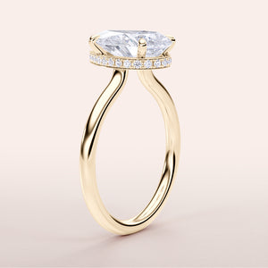 Modern Pear Diamond Engagement Ring in 14K Yellow Gold, featuring unique hexagon-shaped diamond and elegantPave band.