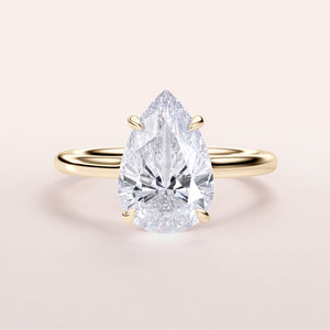 Pear-shaped diamond engagement ring with an invisible gallery and hidden halo in 14K/18K gold or platinum setting.