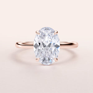 Stunning 14K/18K rose gold engagement ring with oval diamond, hidden halo, plain band. Also available in platinum.