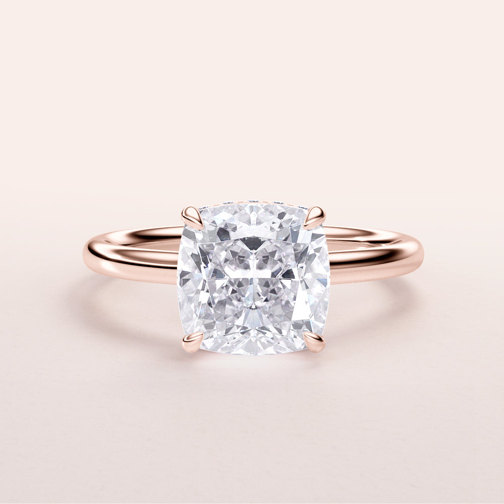 Elegant rose gold cushion-cut diamond engagement ring, available in 14K, 18K or platinum, with a timeless design and hidden halo.
