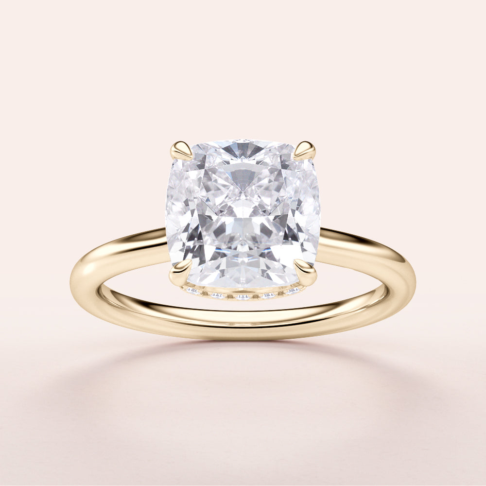 Elegant 14K Gold Engagement Ring featuring a Stunning Cushion Cut Diamond, perfect for engagements and special occasions.
#14KRecycledYellowGold
#18KRecycledYellowGold