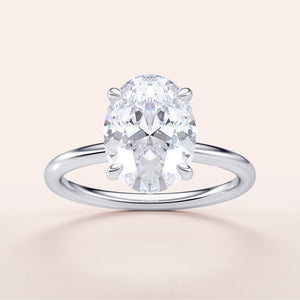 Elegant 14K White Gold Oval Classic Solitaire Engagement Ring Featuring a Stunning Diamond. Perfect for Proposals!
