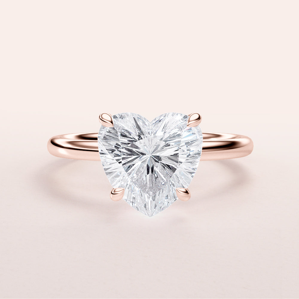 Heart-shaped diamond engagement ring in 14K or 18K rose gold, showcasing classic solitaire design. Shown unmodeled.|







#14KRecycledRoseGold
#18KRecycledRoseGold


