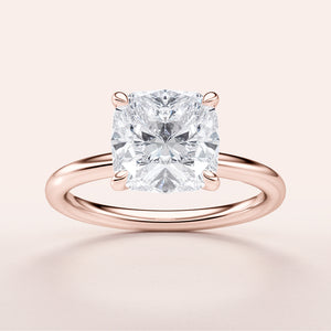 Luxurious 14K or 18K rose gold cushion cut diamond engagement ring, timeless design perfect for special occasions.