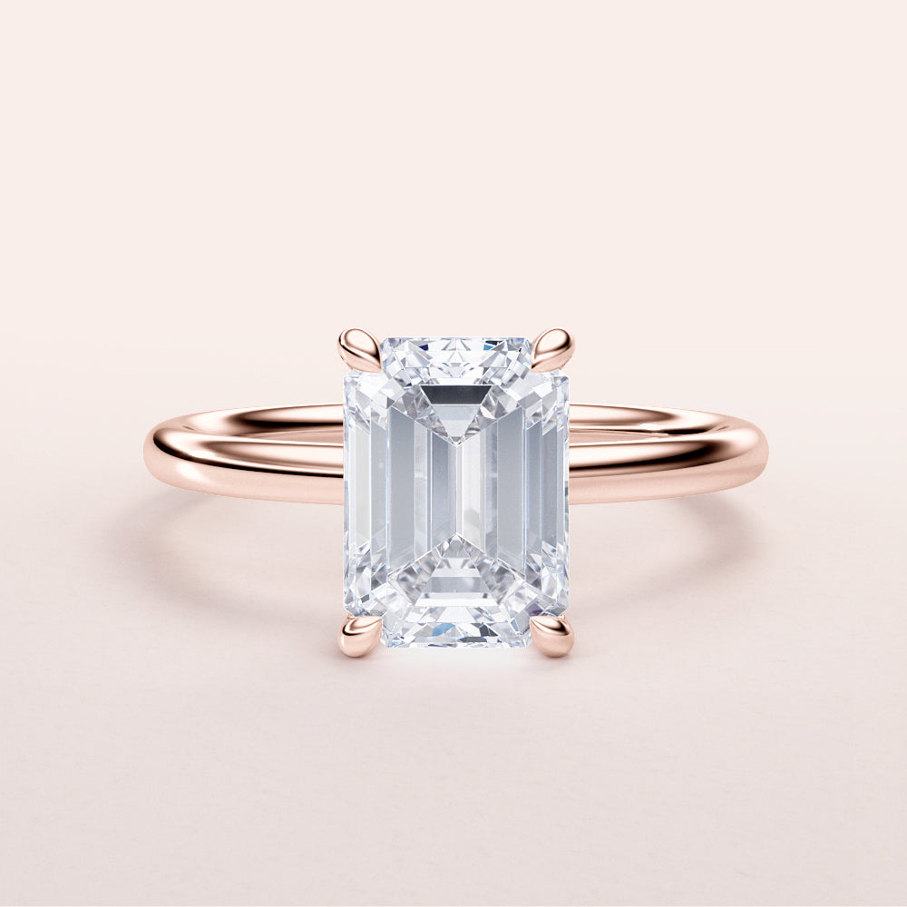 Close-up view of EMERALD-cut diamond engagement ring in rose gold, available in 14K, 18K, or platinum. Exquisite craftsmanship!|







#14KRecycledRoseGold
#18KRecycledRoseGold


