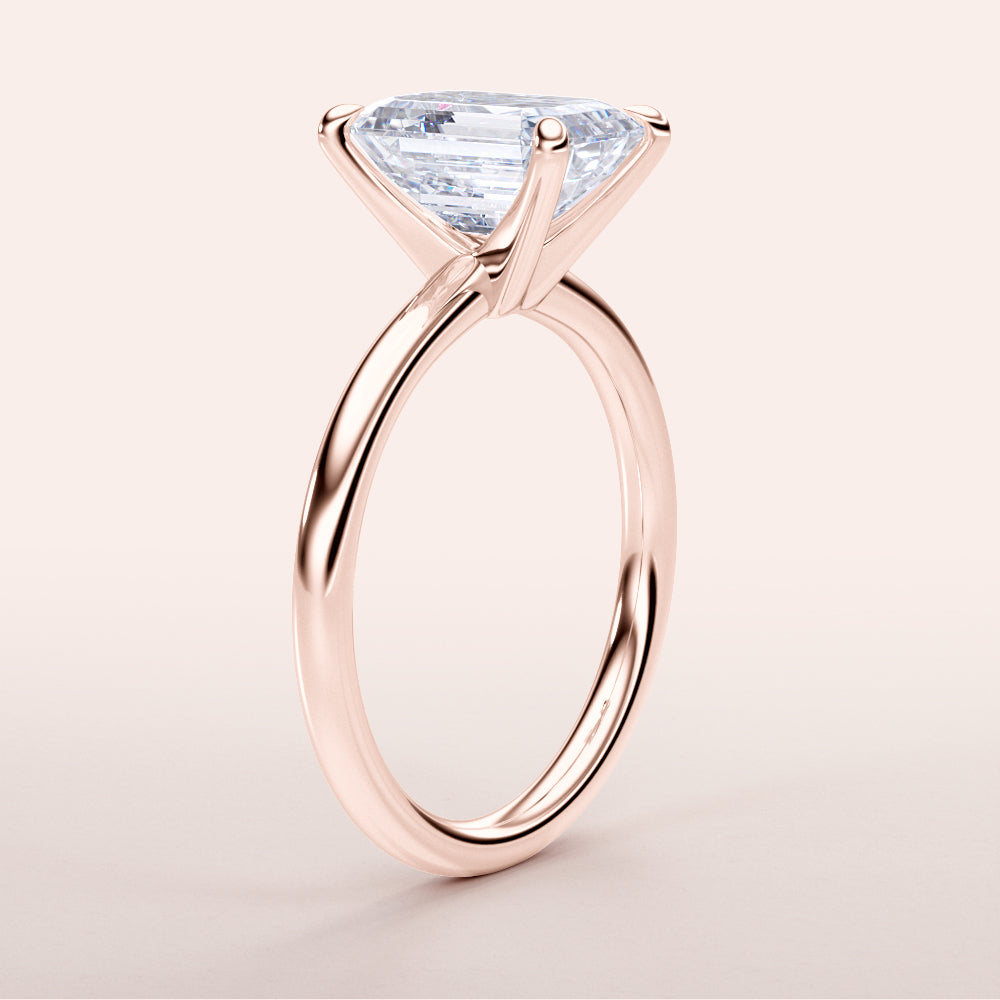 Elegant 14K rose gold engagement ring featuring a stunning elongated trapezoid-shaped diamond, exuding timeless luxury.|







#14KRecycledRoseGold
#18KRecycledRoseGold


