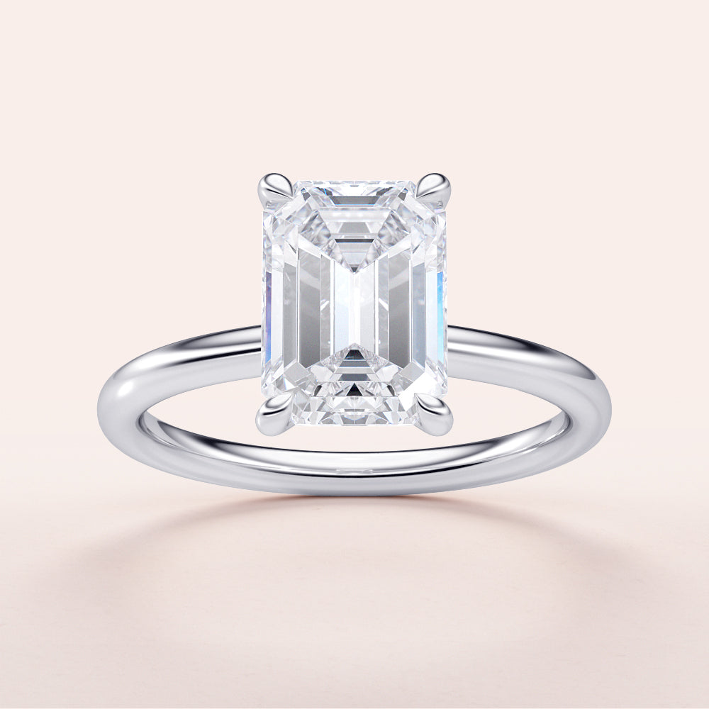 Emerald-cut diamond engagement ring in 14K or 18K white gold, showcasing an elegant solitaire design. Not worn on model.|

#14KRecycledWhiteGold
#18KRecycledWhiteGold








#Platinum