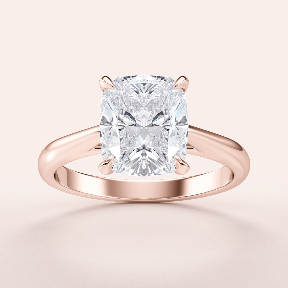 Elegant cushion-shaped diamond engagement ring in Rose Gold, available in 14K & 18K gold or platinum. Polished band design.|







#14KRecycledRoseGold
#18KRecycledRoseGold


