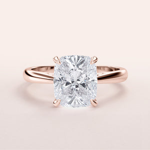 Elegant 14K Rose Gold engagement ring featuring a cushion cut diamond, perfect for your timeless love story.