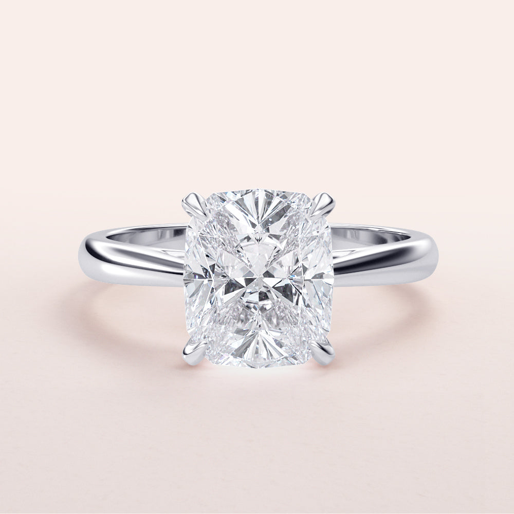 "Luxurious 14K or 18K white gold engagement ring featuring a stunning cushion cut diamond, elegantly displayed."|

#14KRecycledWhiteGold
#18KRecycledWhiteGold








#Platinum