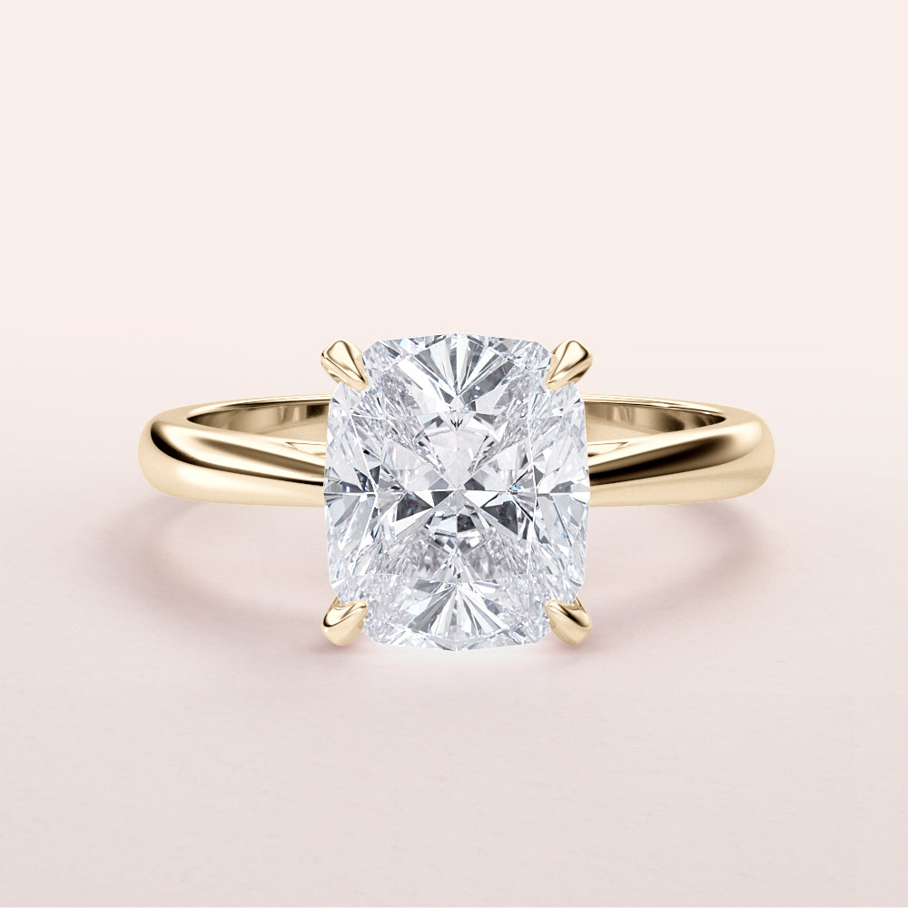Elegant 14K/18K yellow gold cushion-cut diamond engagement ring, featuring a sparkling diamond in a classic cathedral setting.|




#14KRecycledYellowGold
#18KRecycledYellowGold






