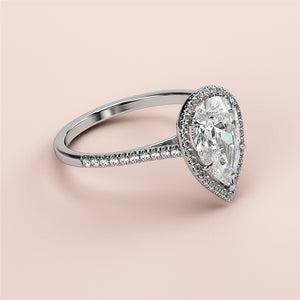 Exquisite pear-shaped diamond engagement ring in 14K/18K gold or platinum, featuring a halo setting and diamond-accented band.