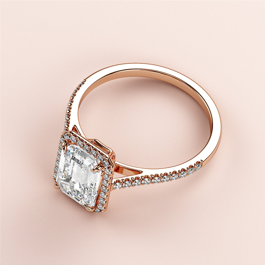 Elegant 14K Rose Gold engagement ring with Asscher-Cut diamond center, halo, and pave-set diamonds for special occasions.