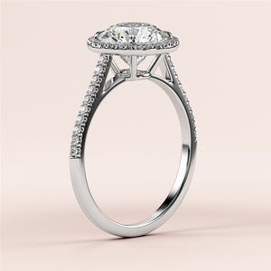 Elegant 14K white gold engagement ring featuring a cushion-cut diamond and a sparklingPave band. Perfect for your special moment.