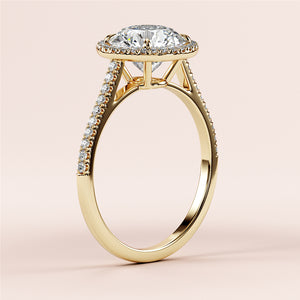 "Elegant 14K yellow gold engagement ring featuring a round halo design withPave diamond accents for a stunning sparkle."