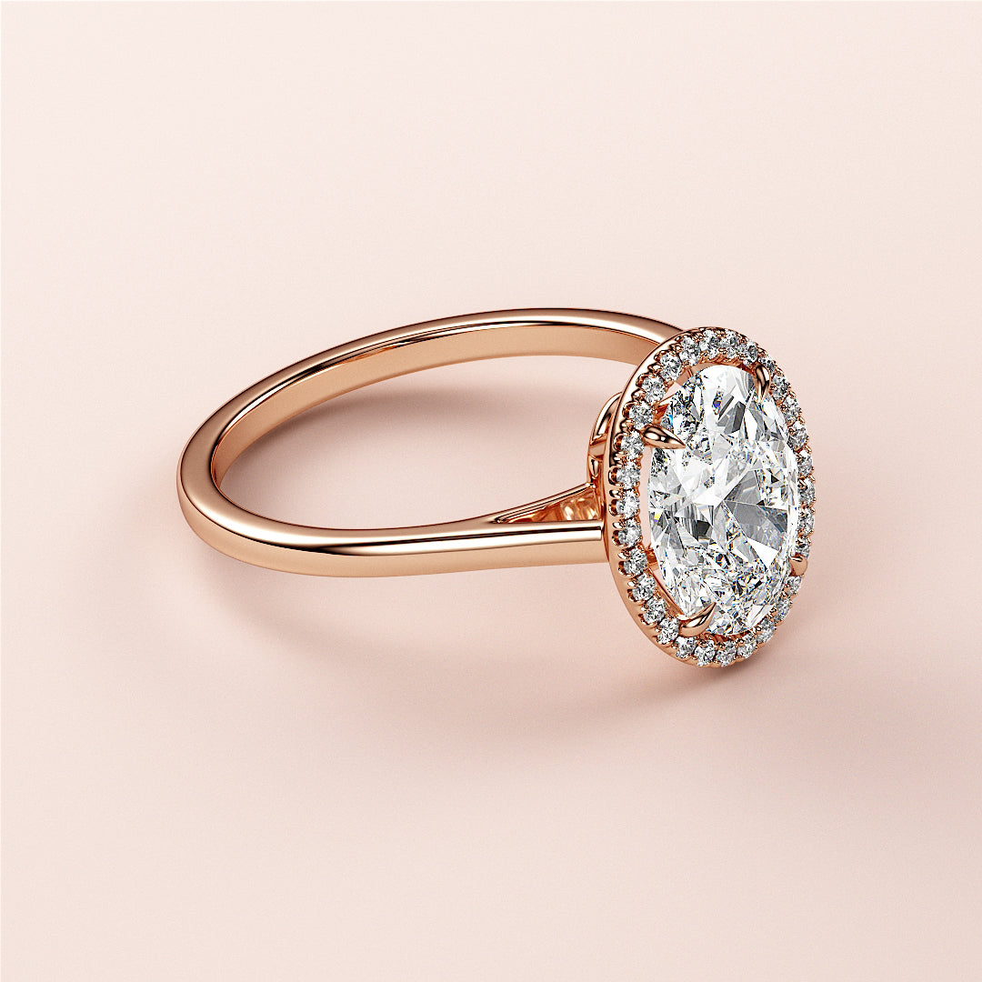 Elegant rose gold engagement ring with an oval diamond and halo, available in 14K, 18K, or platinum. Perfect for your special day.|







#14KRecycledRoseGold
#18KRecycledRoseGold


