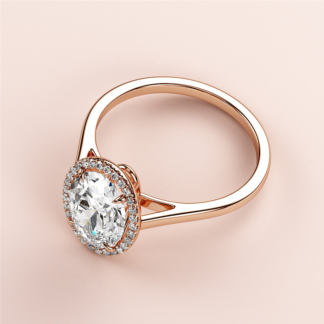 Stunning 14K rose gold oval-shaped halo engagement ring with diamonds, perfect for a timeless proposal. Not model worn.|







#14KRecycledRoseGold
#18KRecycledRoseGold


