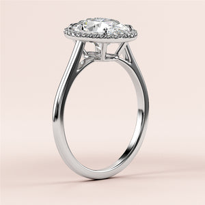 Elegant engagement ring featuring a round brilliant-cut diamond in aPave halo, available in 14K & 18K gold or platinum.