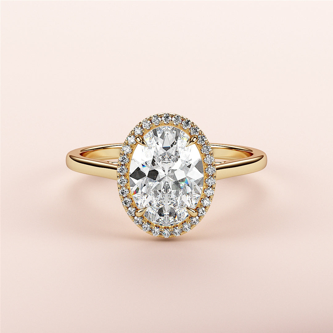 Elegant 14K or 18K gold halo oval diamond engagement ring with pave-set diamonds, perfect for special occasions.|




#14KRecycledYellowGold
#18KRecycledYellowGold





