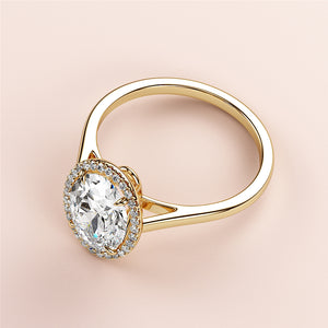 Elegant 14K yellow gold engagement ring featuring a halo setting with an oval diamond, perfect for special occasions.
