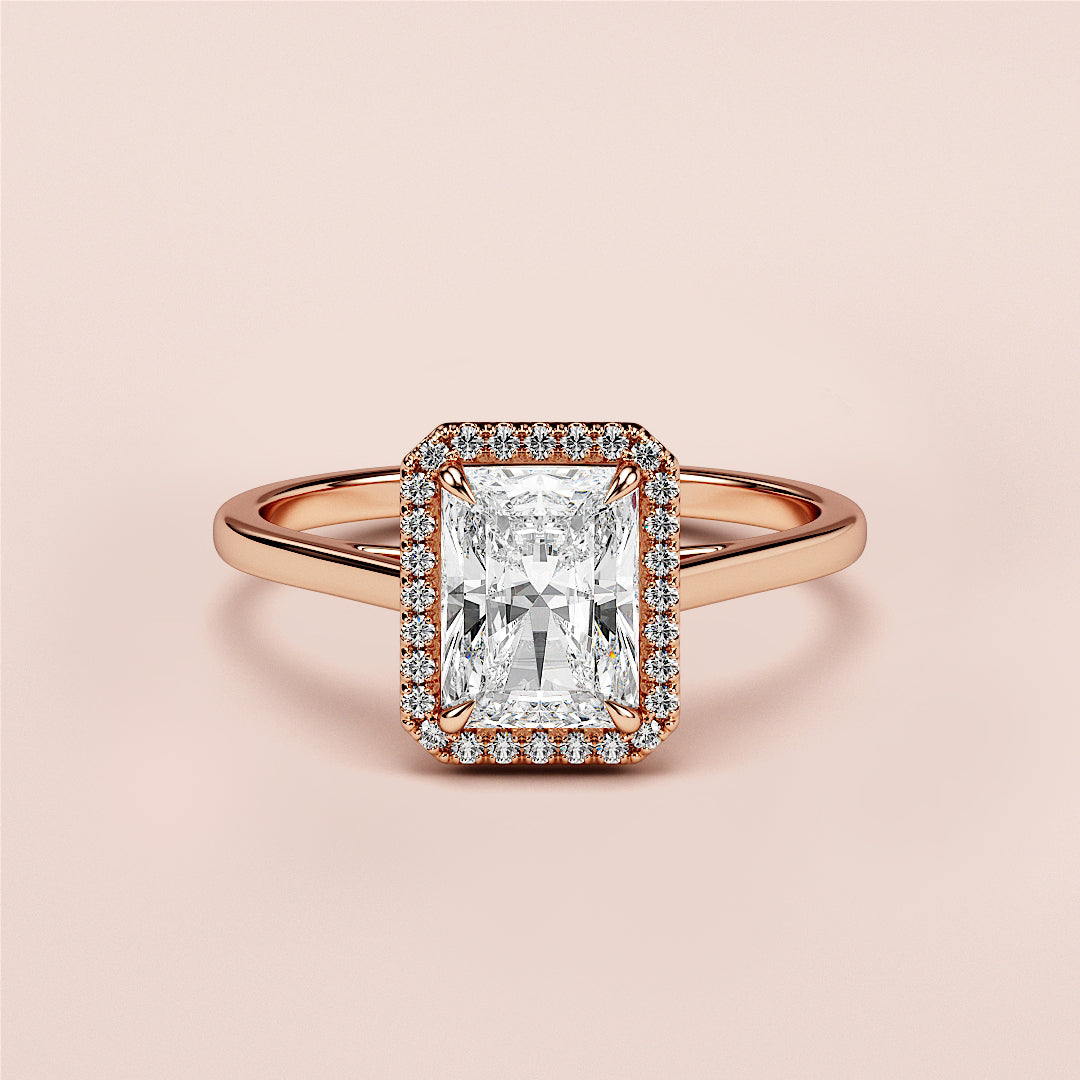 Radiant cut diamond halo engagement ring in 14K or 18K rose gold, featuring an elegant rectangular shape.|







#14KRecycledRoseGold
#18KRecycledRoseGold


