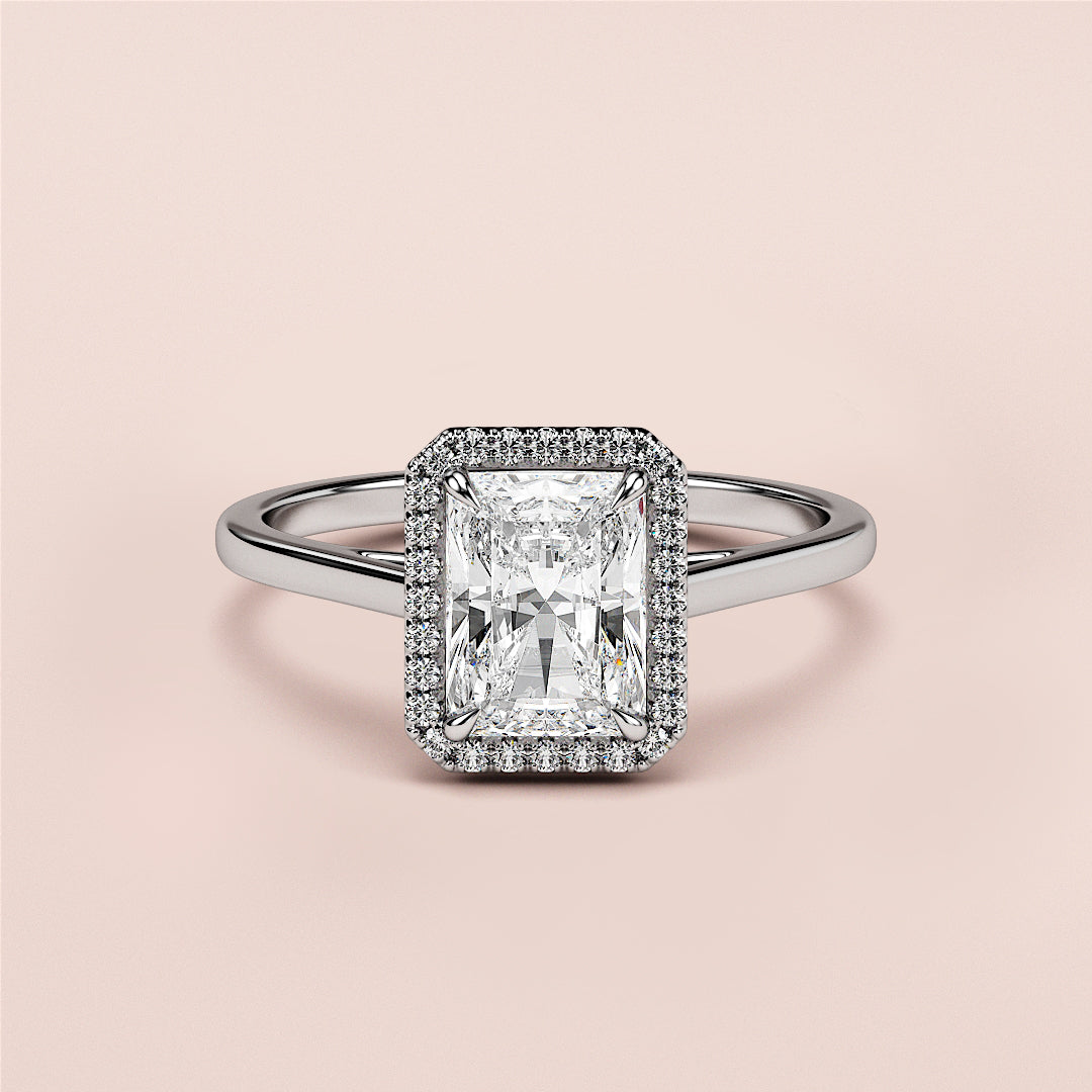 14K white gold radiant cut diamond halo engagement ring with pave setting, displayed on a neutral background.|

#14KRecycledWhiteGold
#18KRecycledWhiteGold








#Platinum