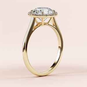 Elegant 14K yellow gold engagement ring with round diamond halo setting, featuring a sophisticated cathedral design.