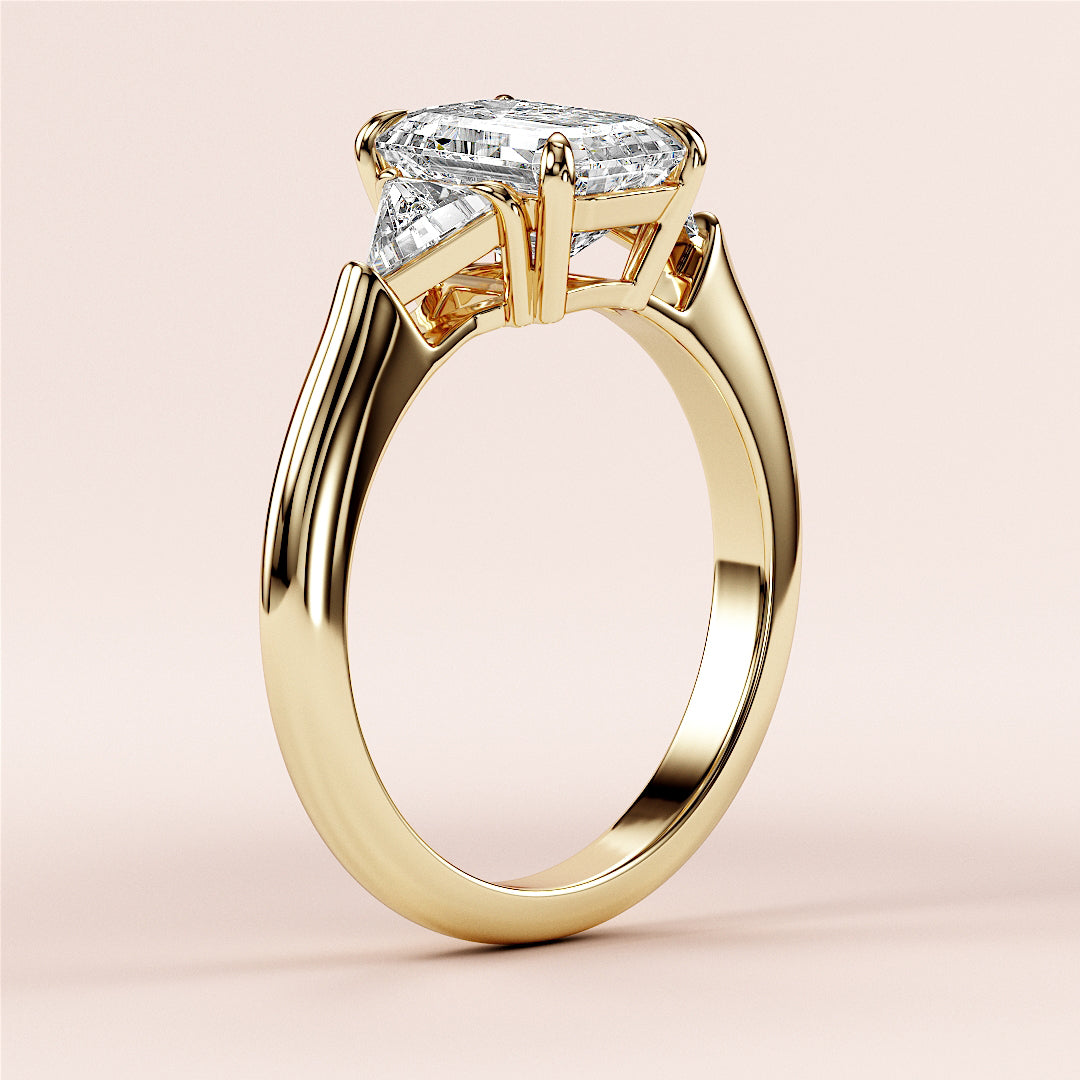 Elegant 14K Yellow Gold Engagement Ring with Three Emerald Stones in Triangle Setting - Stunning Bridal Jewelry Option