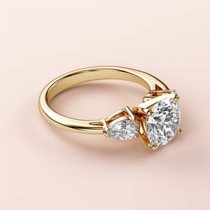 Elegant 14K or 18K gold engagement ring with round brilliant diamond centerpiece and side diamonds, showcasing exquisite craftsmanship.
